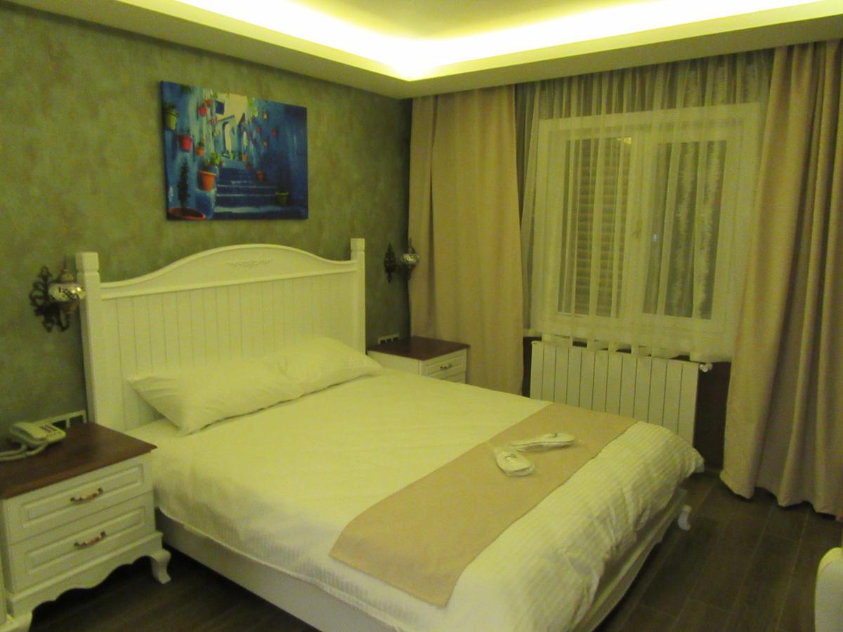 Trilye Kaplan Hotel Муданья Экстерьер фото