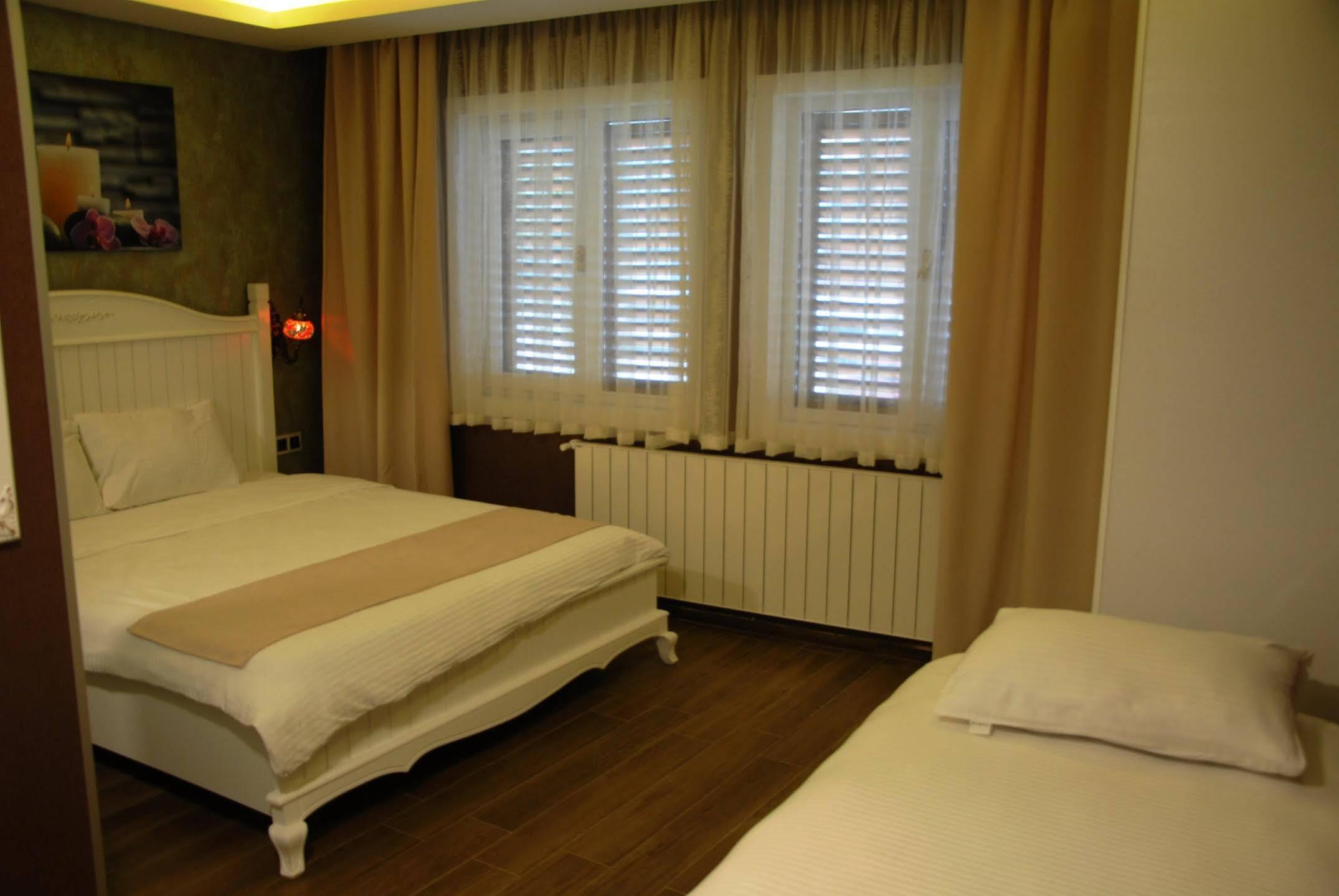 Trilye Kaplan Hotel Муданья Экстерьер фото