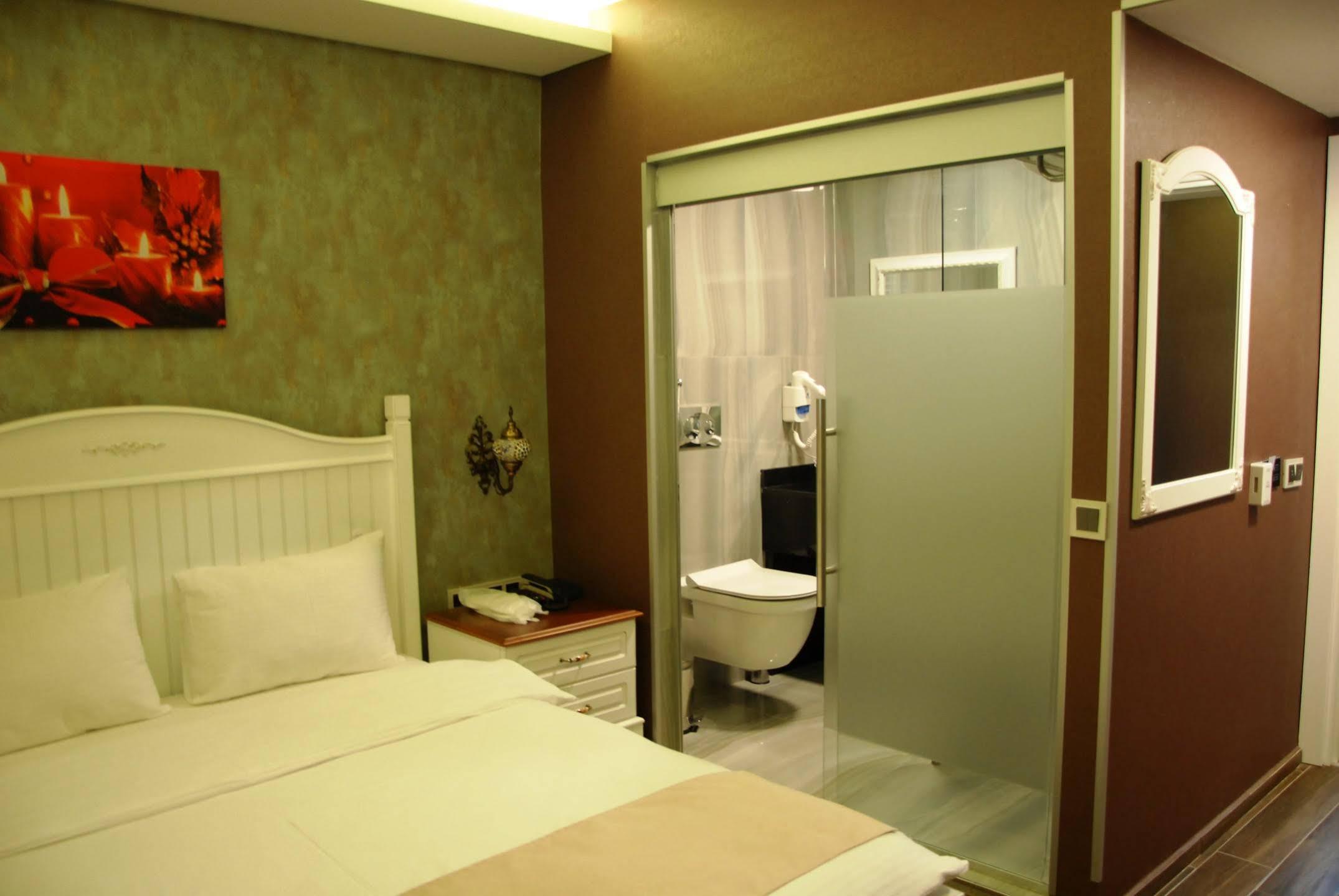 Trilye Kaplan Hotel Муданья Экстерьер фото